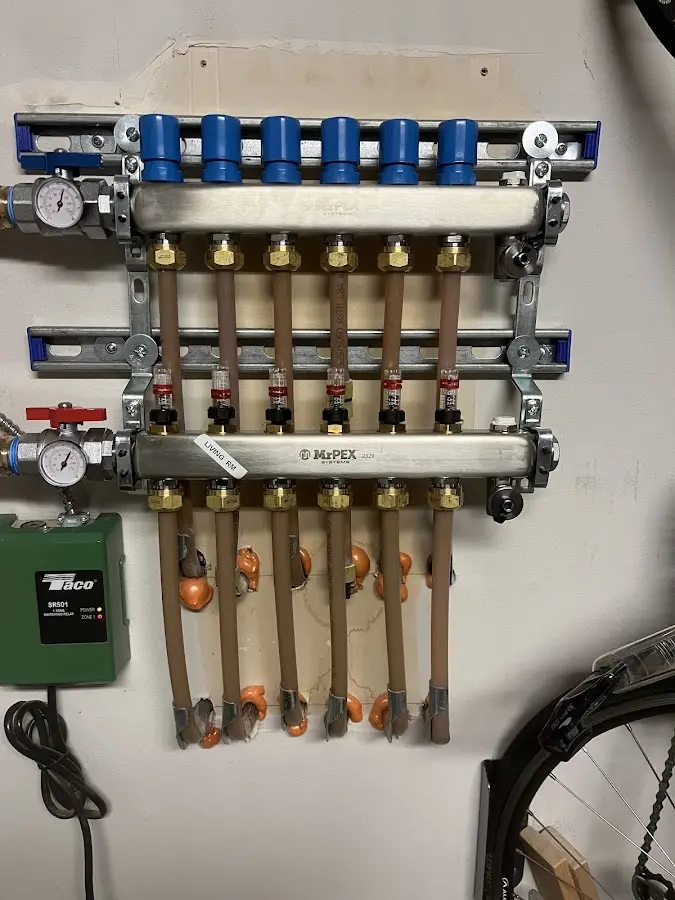 Plumber performing Gas Line Installation at a residential property in Farmington